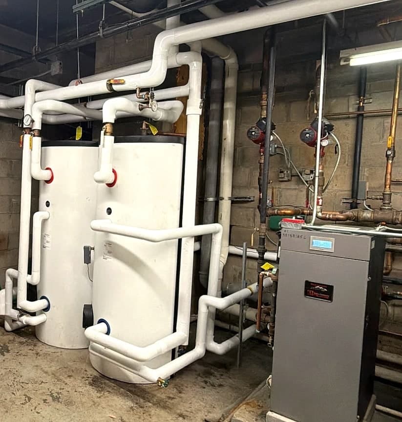 HTP SuperStor Ultra indirect water heaters piped to the building's existing boiler